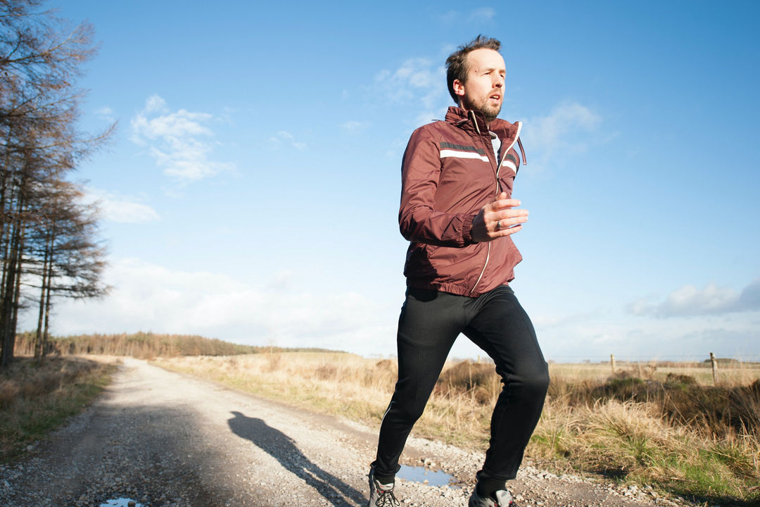 Man running on trail